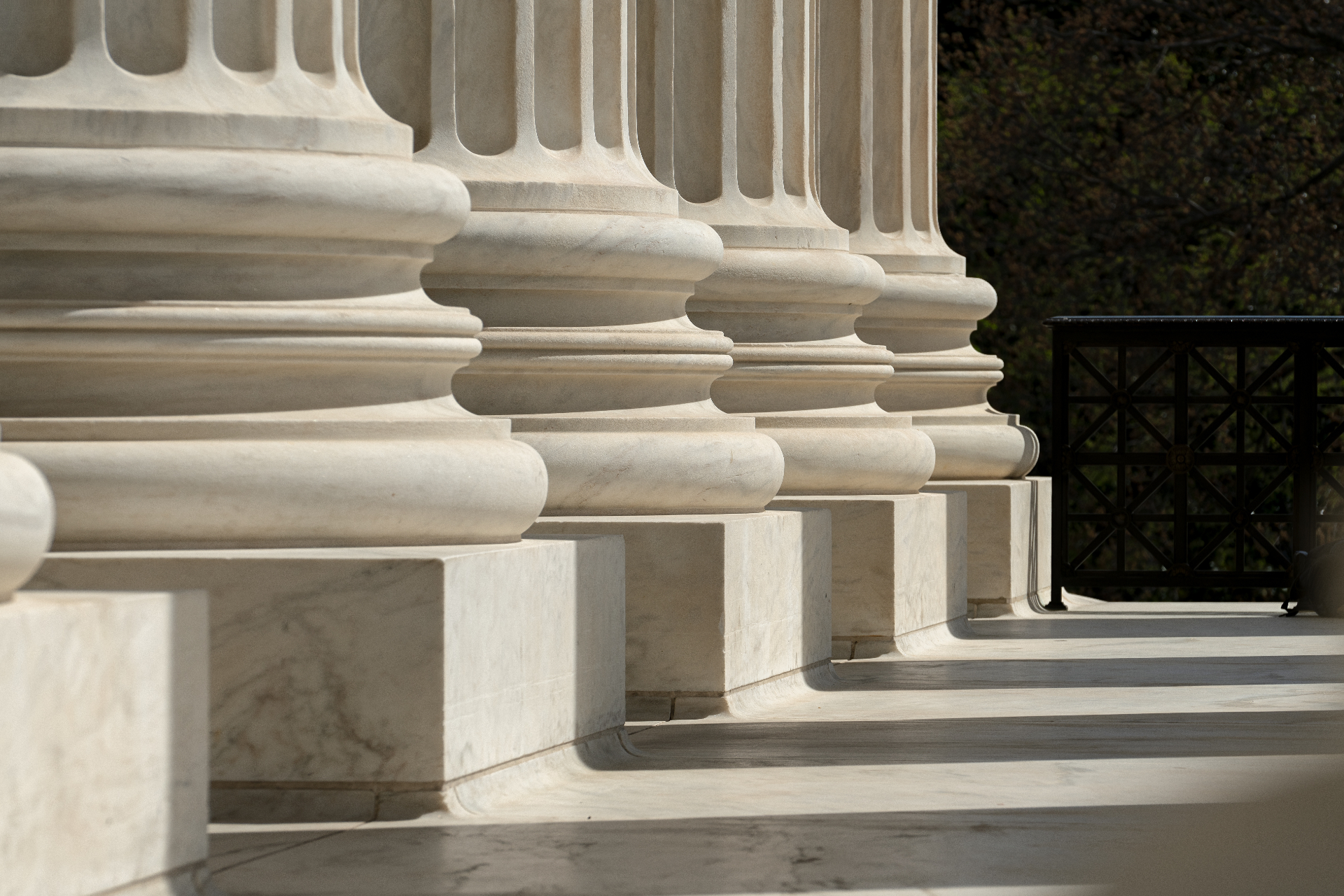 Marble columns at the base of a state judicial building
